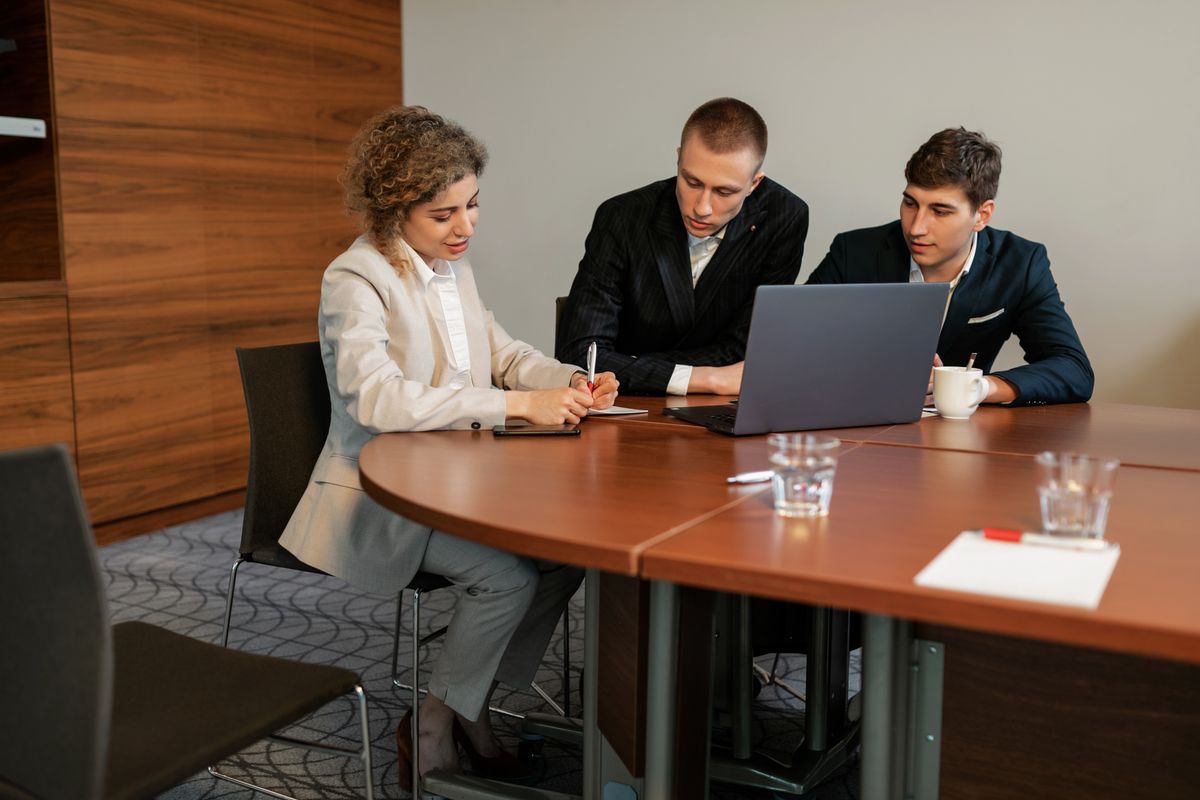 Banking leaders reviewing candidate data