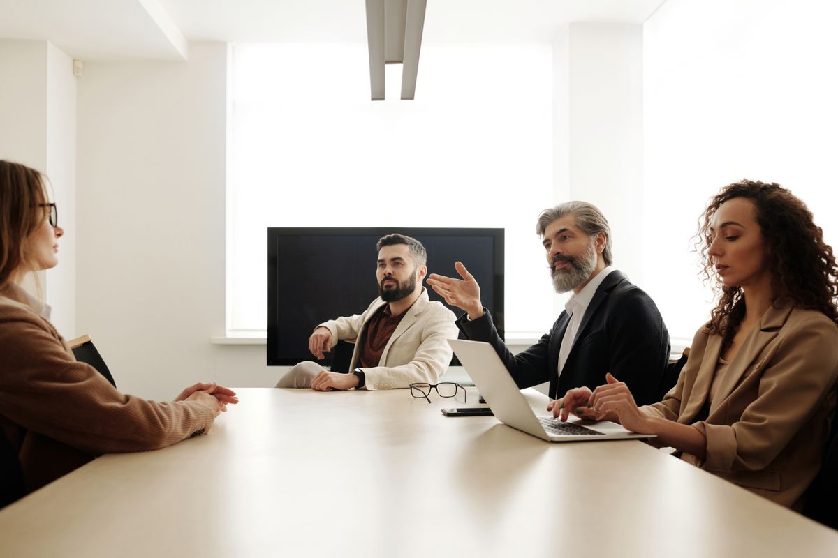 Senior banking leaders in a boardroom review